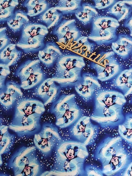 „ Mickey Mouse ” uz zila fona (cena par 0,5m)